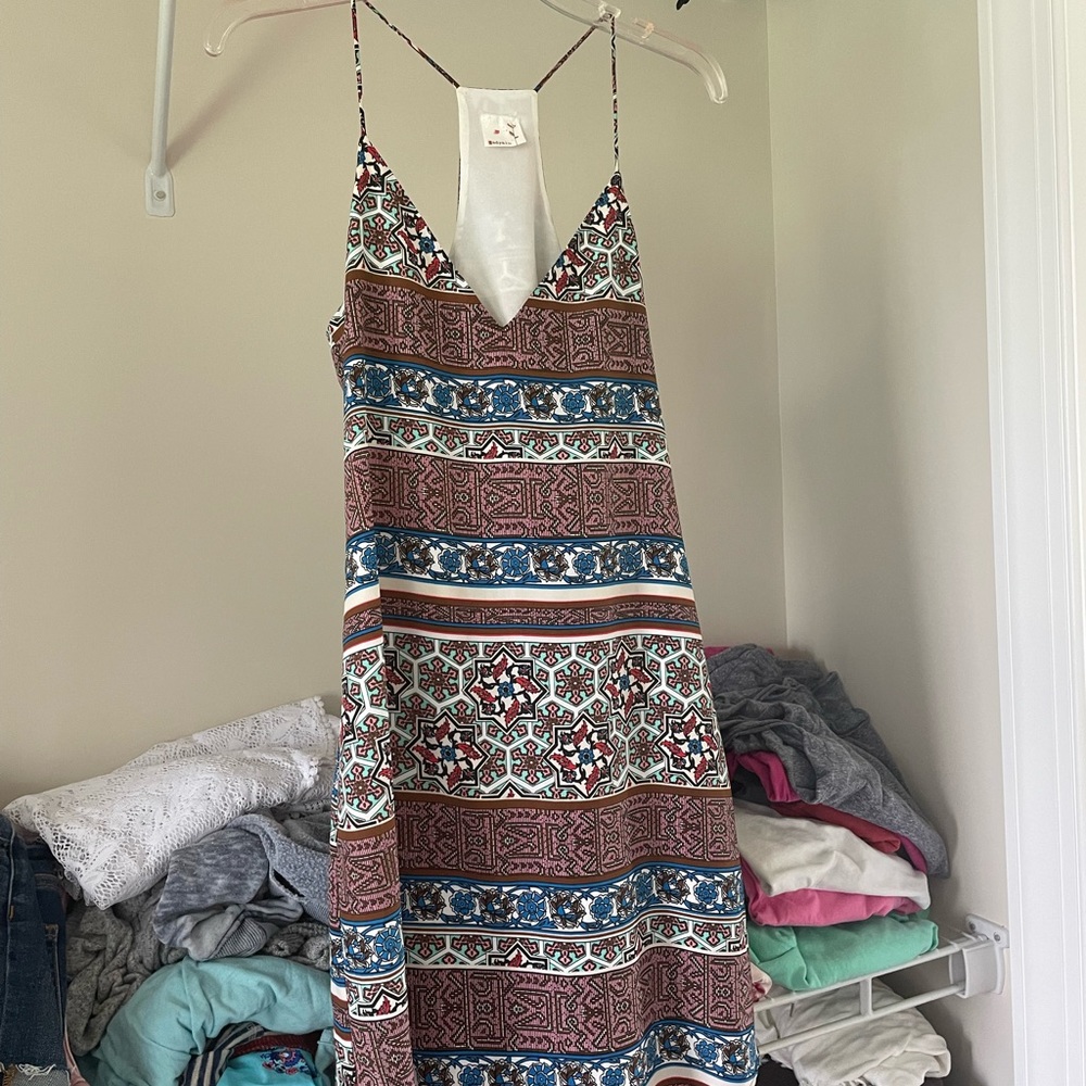 Never worn! Cute mini/midi dress.